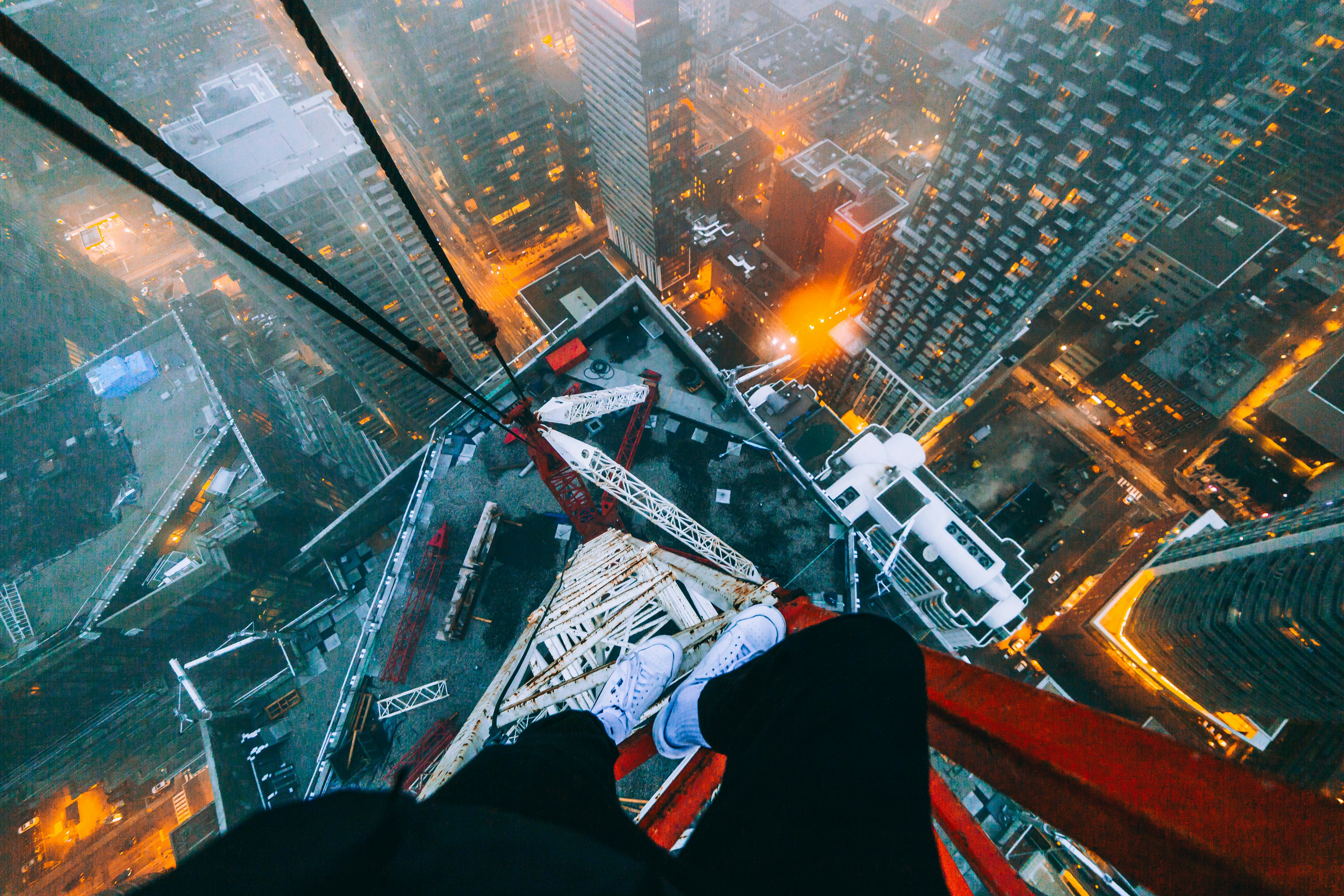 a person standing on top of a tall building
