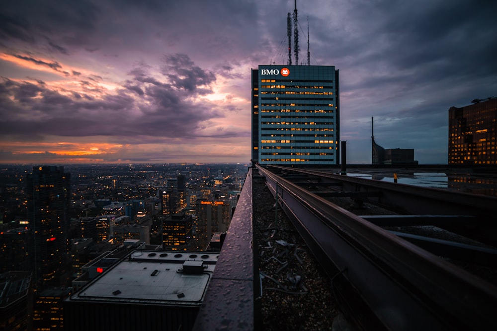 a very tall building with a sky line in the background