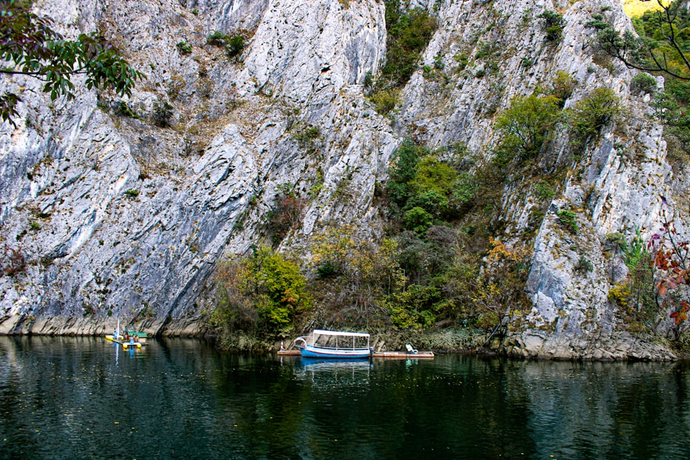 a boat floating on top of a body of water