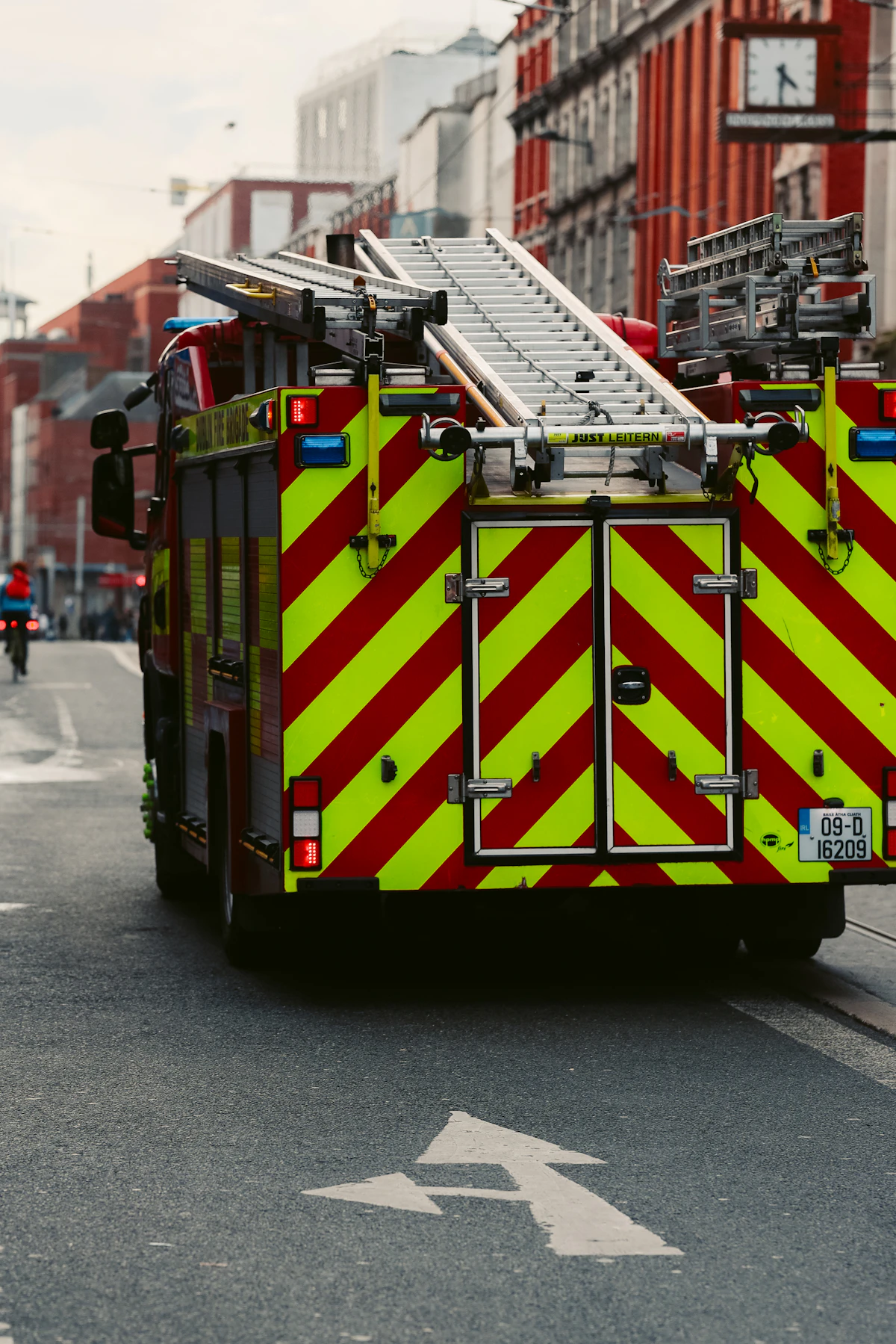 Fire truck and emergency response vehicle in an urban street