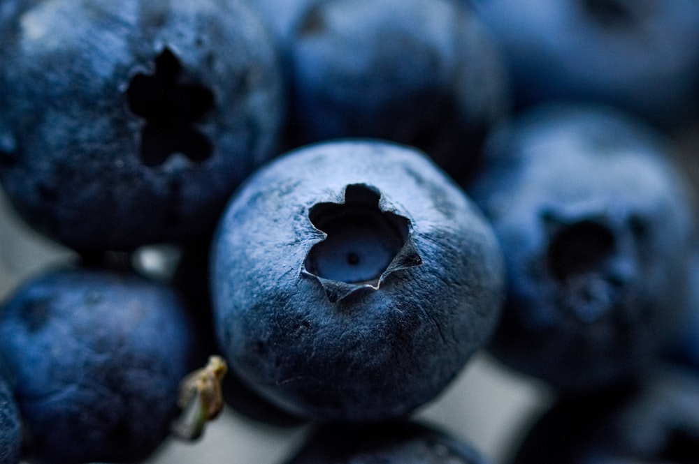 a close up of a bunch of blueberries