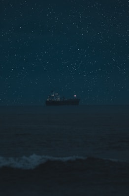 A lone starship silhouetted against a swirling cosmic nebula, hinting at epic space journeys.