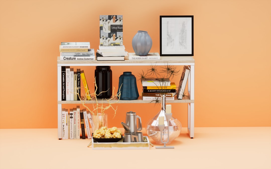 a shelf with vases and books on it