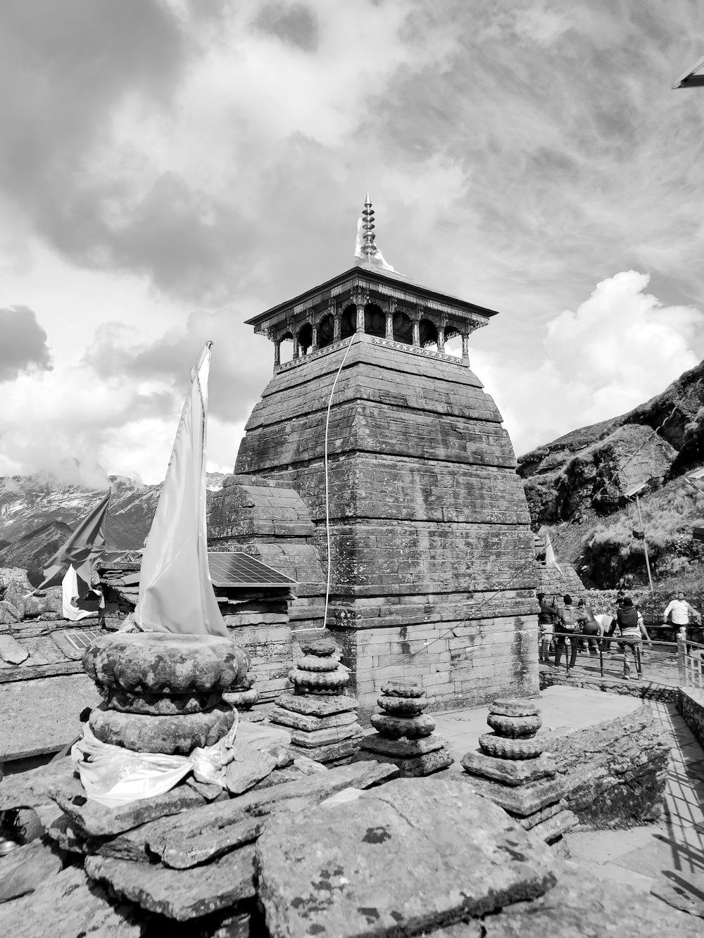 a black and white photo of a stone structure