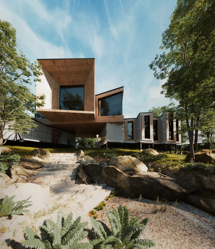 a house on a hill surrounded by trees and rocks