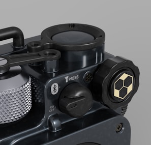 Close-up of a sleek electromechanical medical device with blue and grey accents.