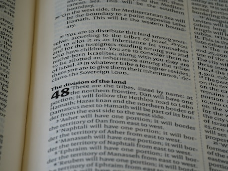 a close up of an open book with text