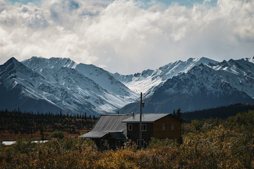 A charming rustic cabin nestled in the Bolivian highlands at sunset