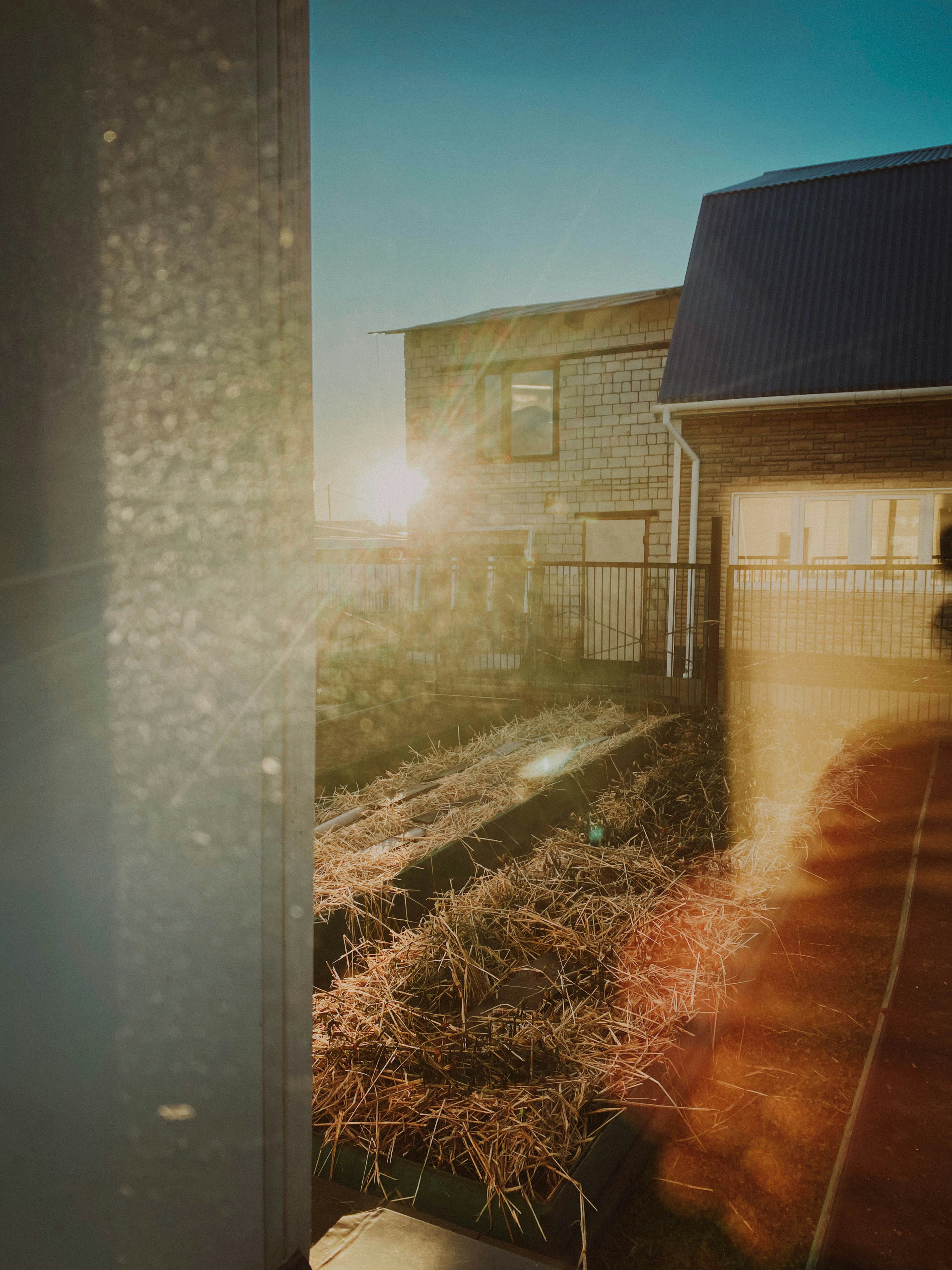 a blurry photo of a person standing in front of a house