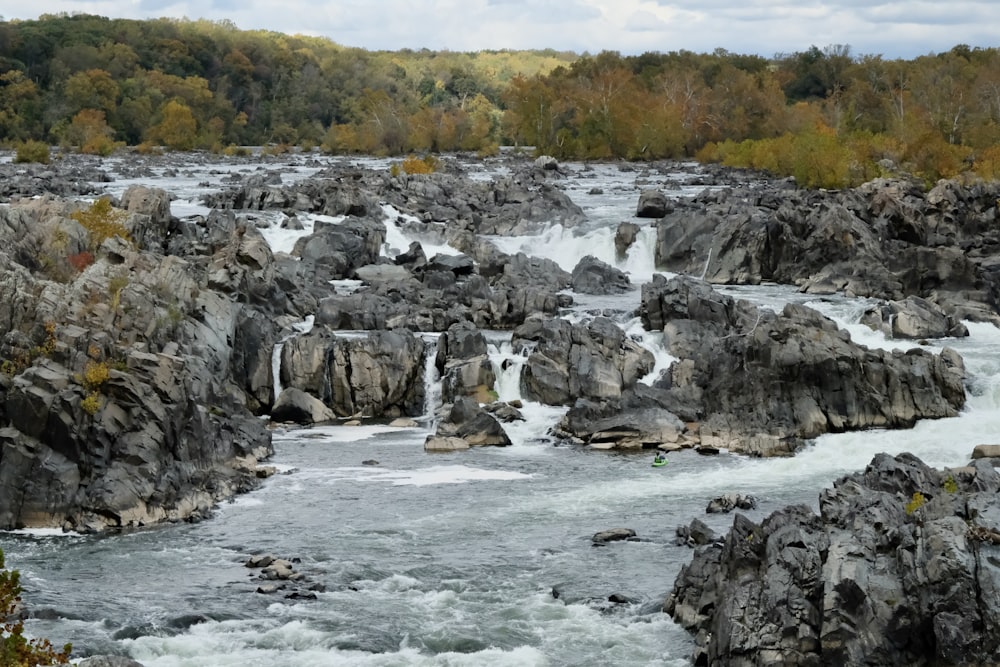 a river that has a bunch of rocks in it