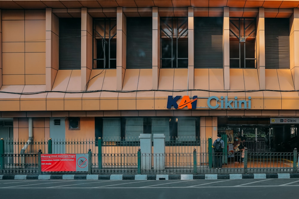 a tall building with a sign on the front of it