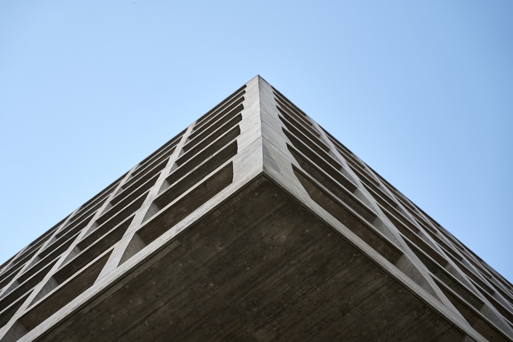 a tall building with a sky background