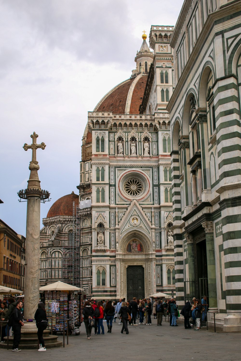 a group of people standing in front of a building