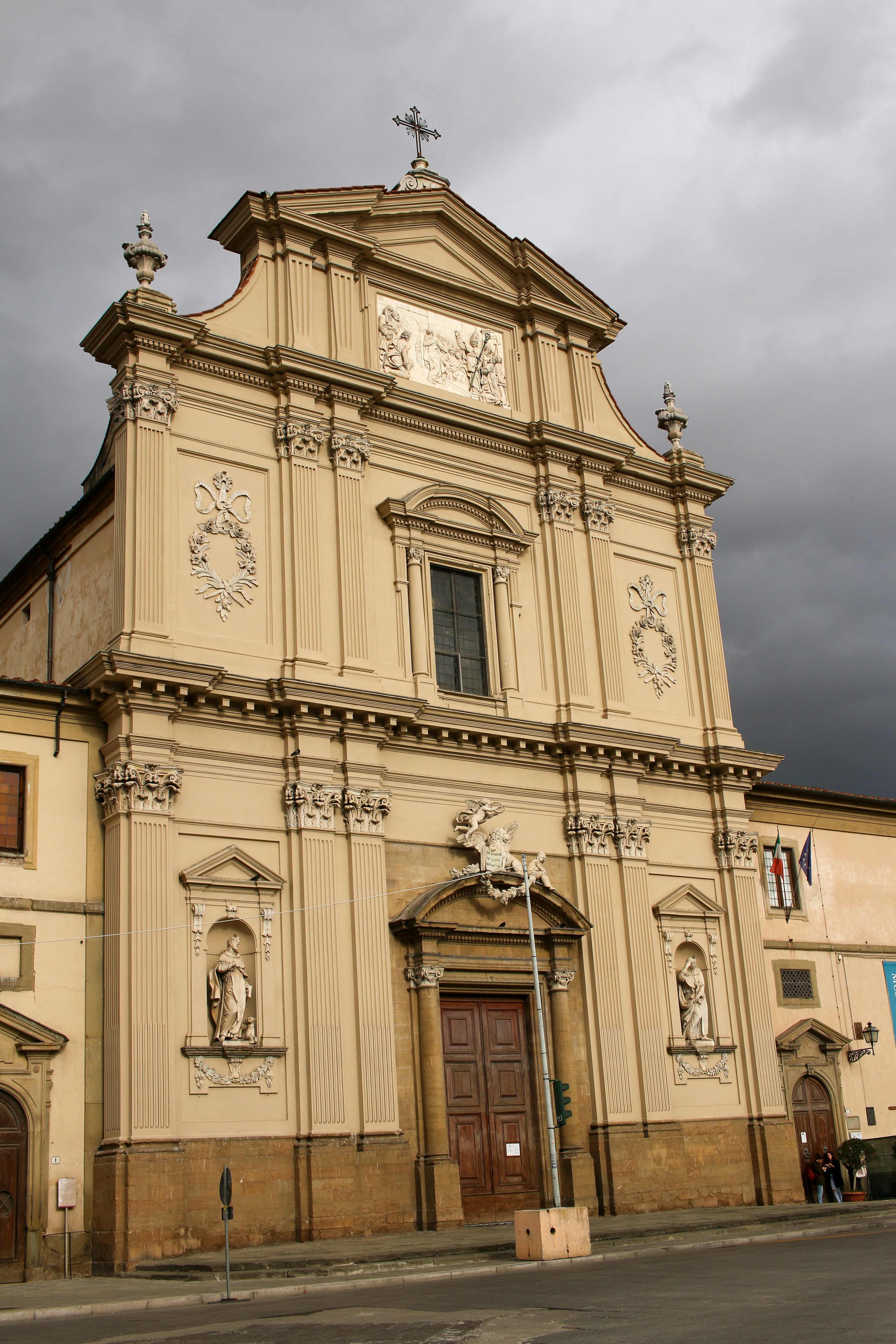 a church with a clock on the front of it