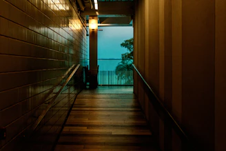 Durable laminate flooring laid in a cozy residential hallway with soft lighting