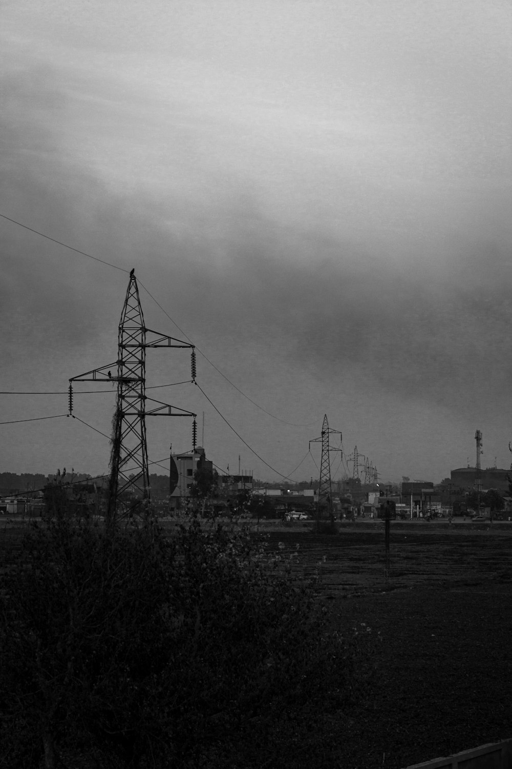 a black and white photo of power lines