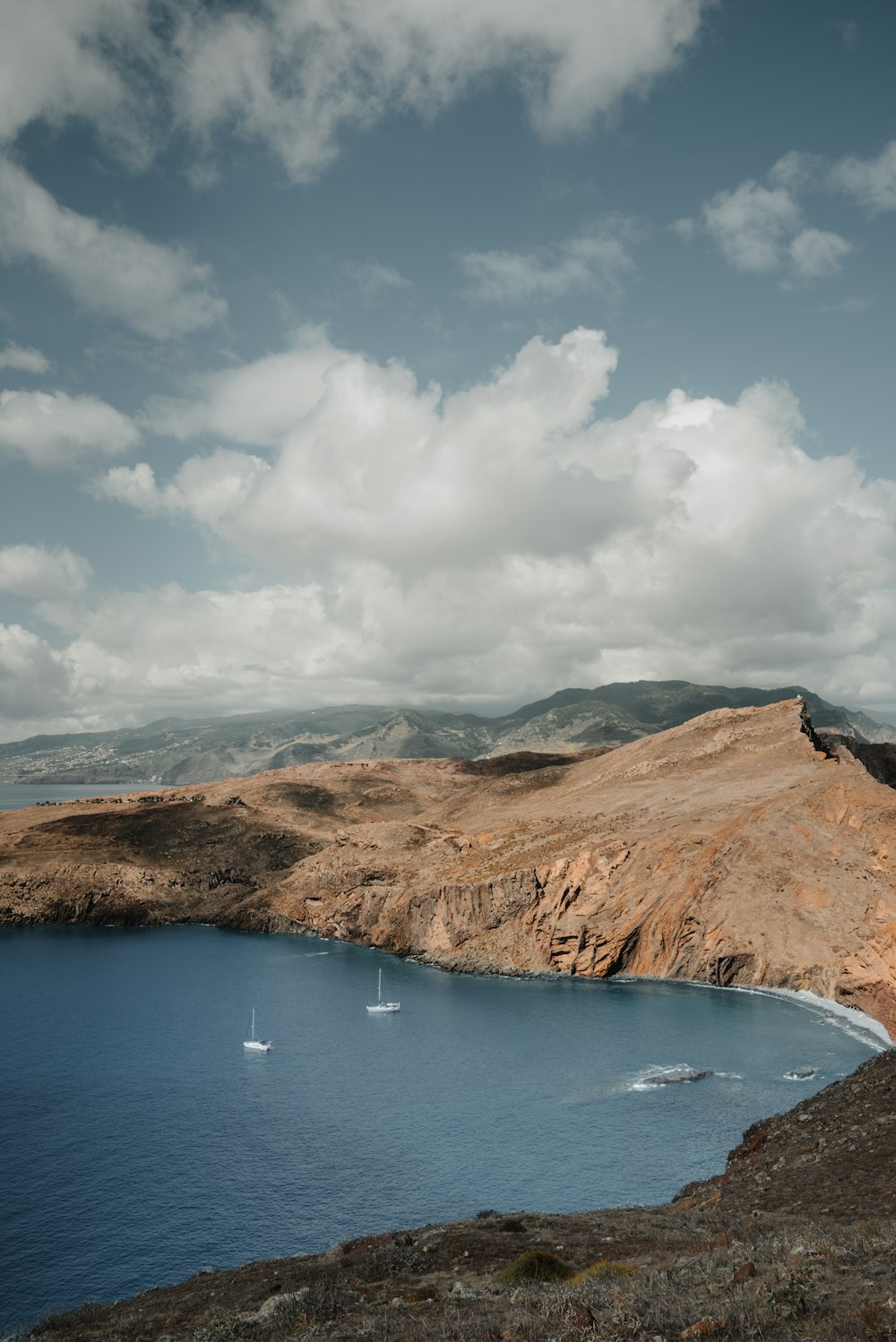 a large body of water surrounded by mountains