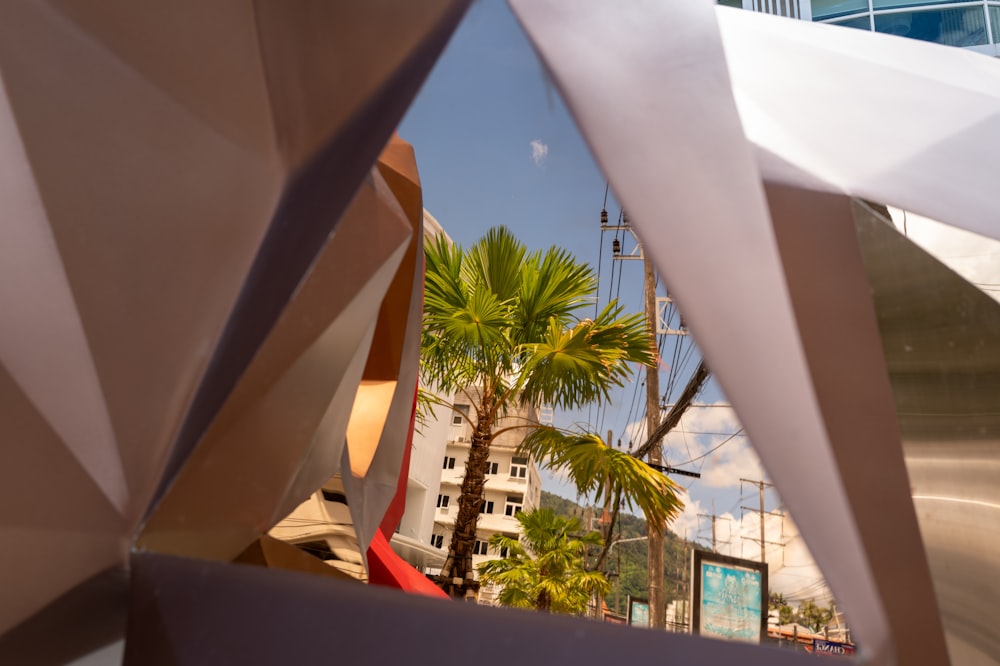 a view of a building through a mirror