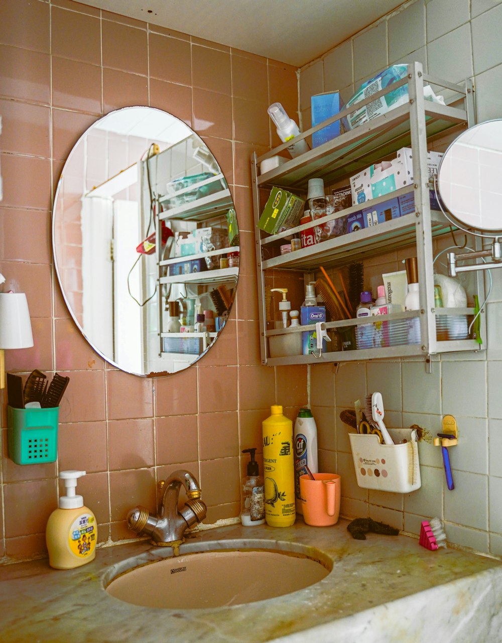 a bathroom sink with a mirror above it