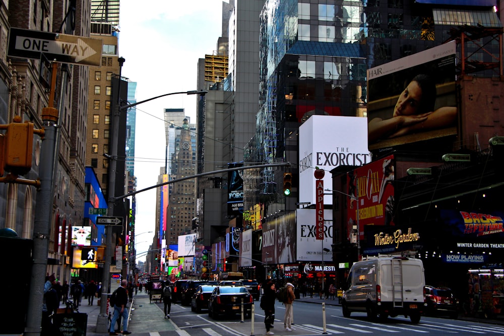 a city street filled with lots of tall buildings