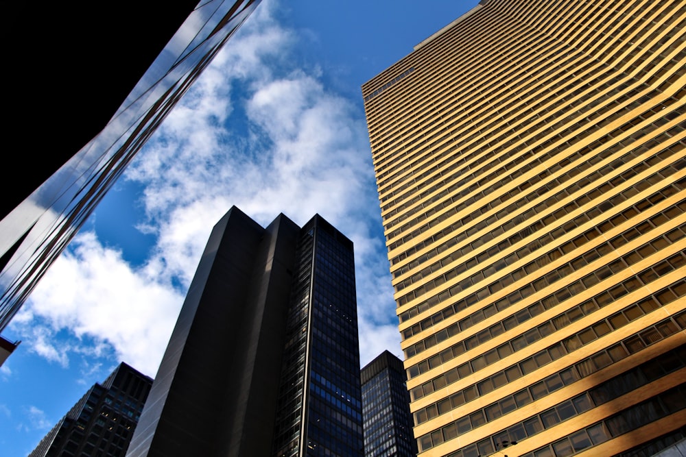 a tall building with a sky background