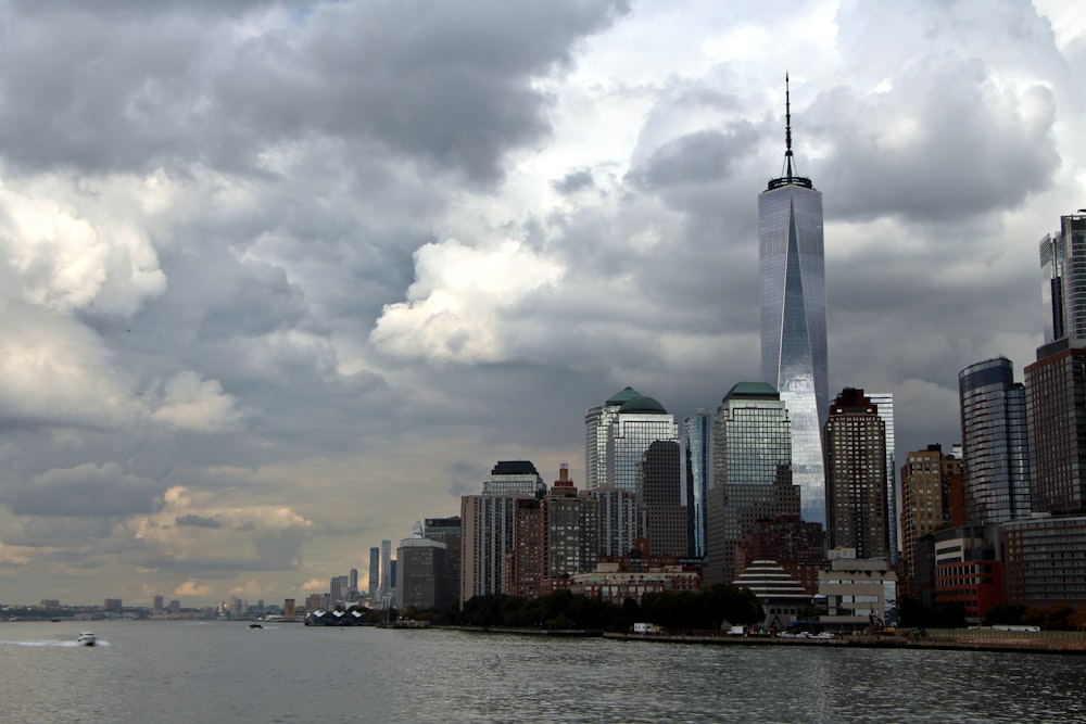 a large body of water surrounded by tall buildings