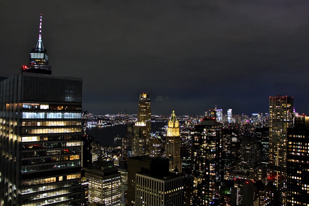 a view of a city at night from the top of a building