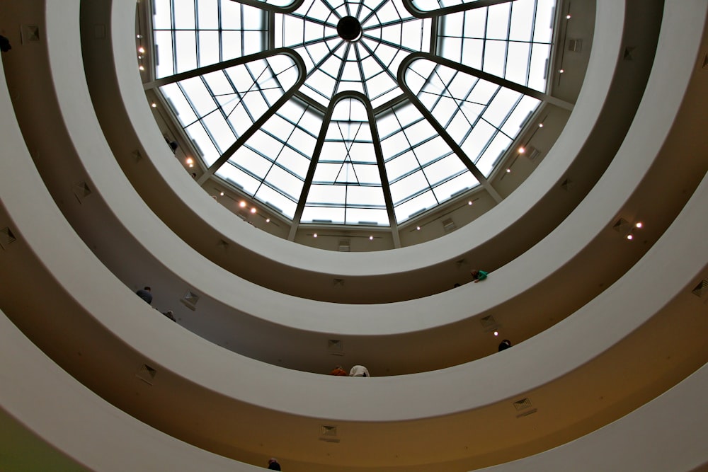 a circular ceiling with a skylight inside of it