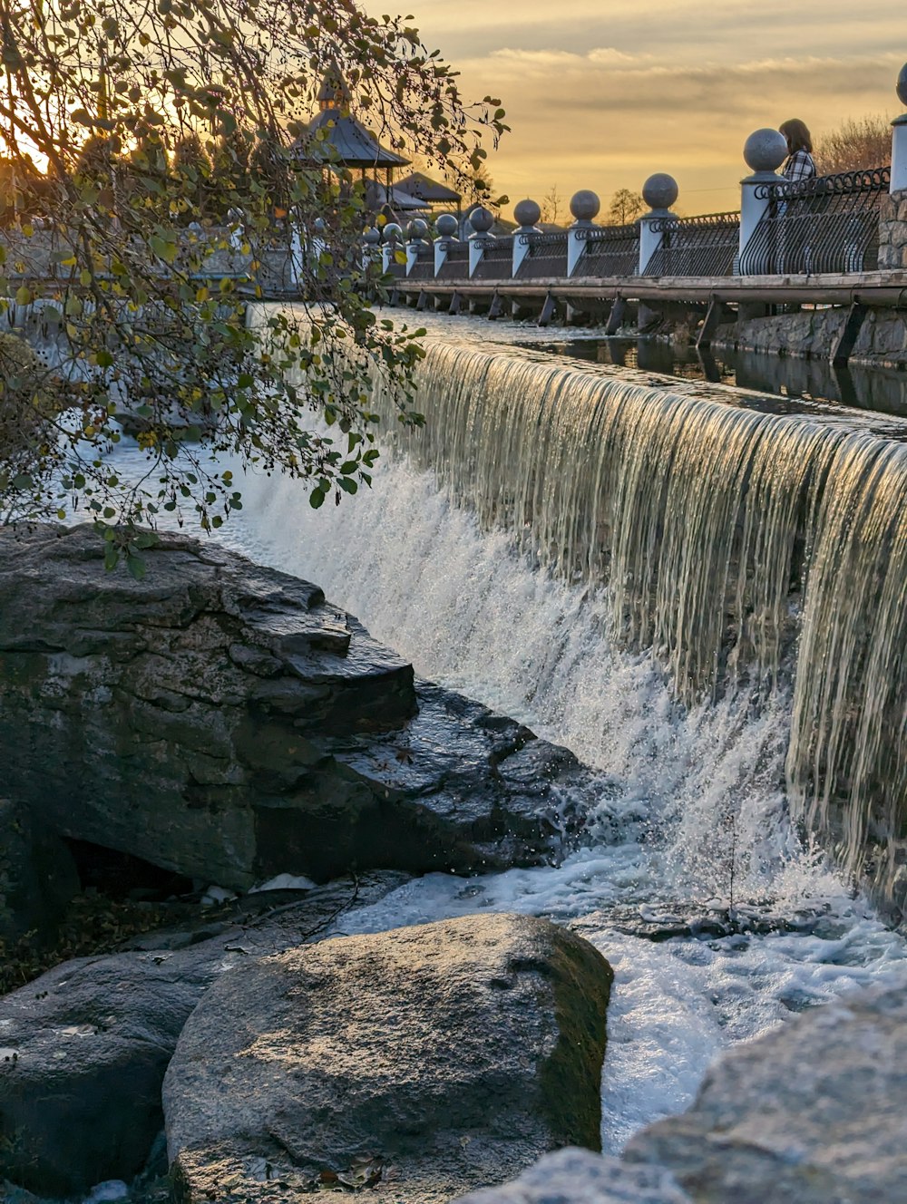 a large waterfall with a bunch of water coming out of it