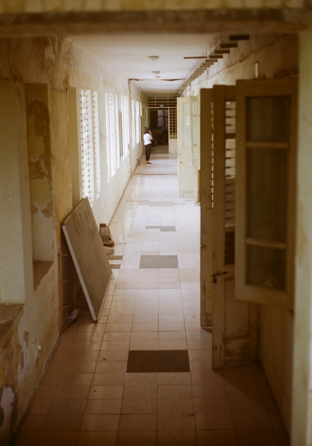 a long hallway with a bunch of windows