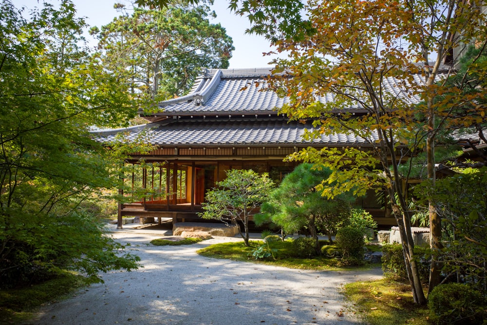 a path leading to a pavilion in a park