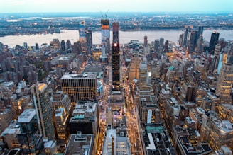 An aerial view of a bustling city skyline, emphasizing urban development and vibrancy.
