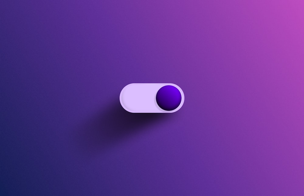 a purple and white object on a purple background