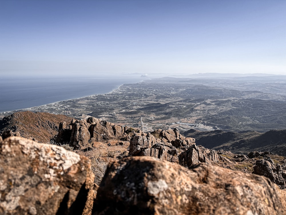 a view of the ocean from the top of a mountain