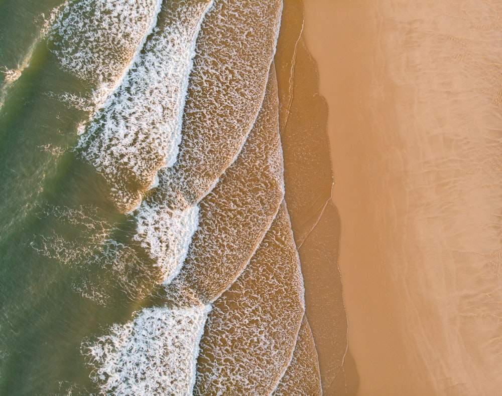 a bird's eye view of a sandy beach