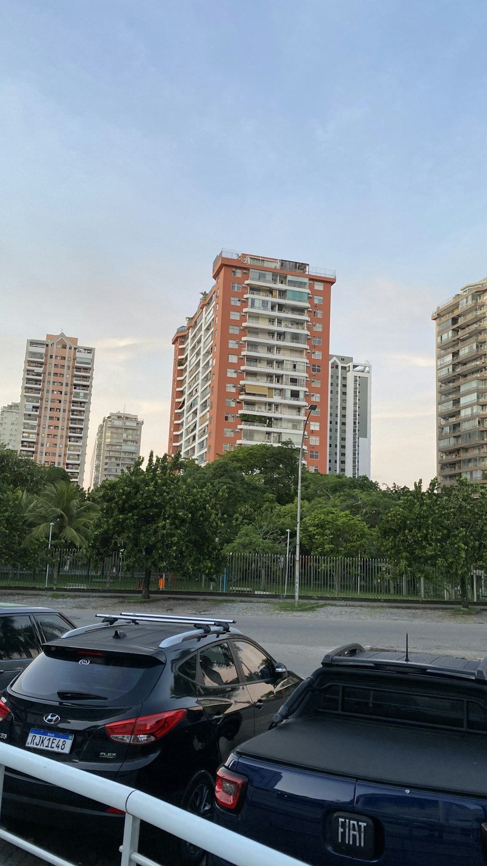 a parking lot filled with lots of parked cars