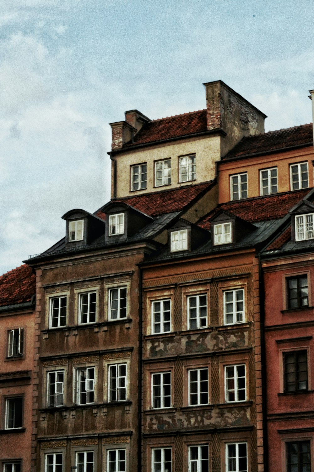 a large building with a clock on the top of it