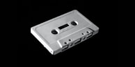 A nostalgic scene featuring a cassette tape and headphones.