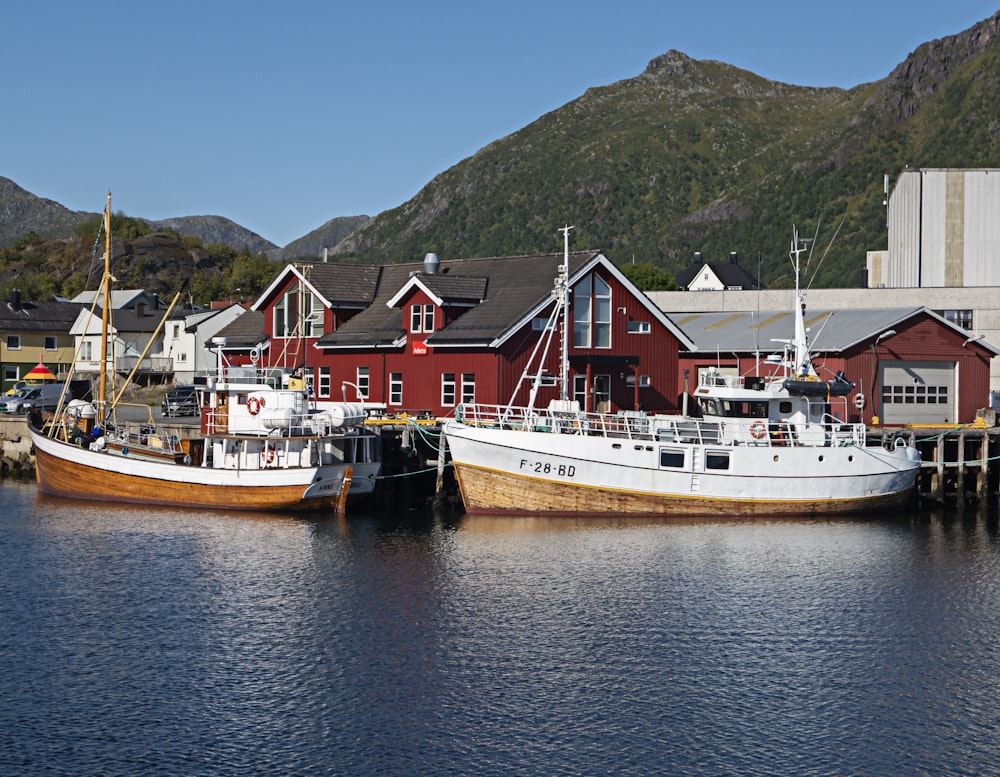 a couple of boats that are sitting in the water