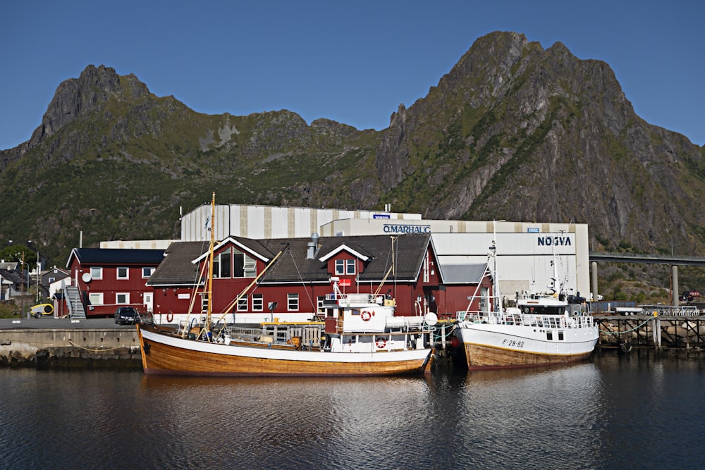 a couple of boats that are sitting in the water