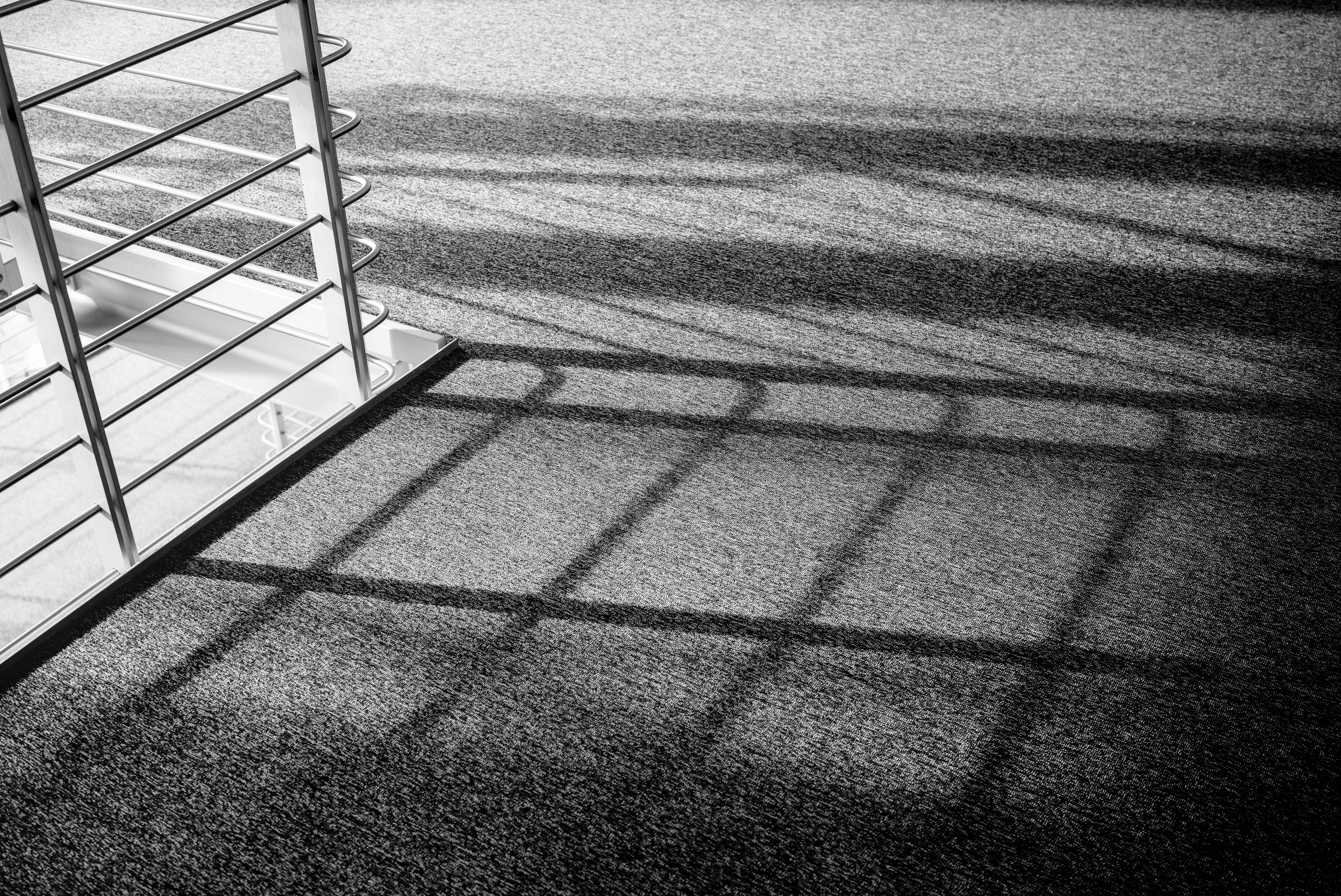 a black and white photo of a staircase