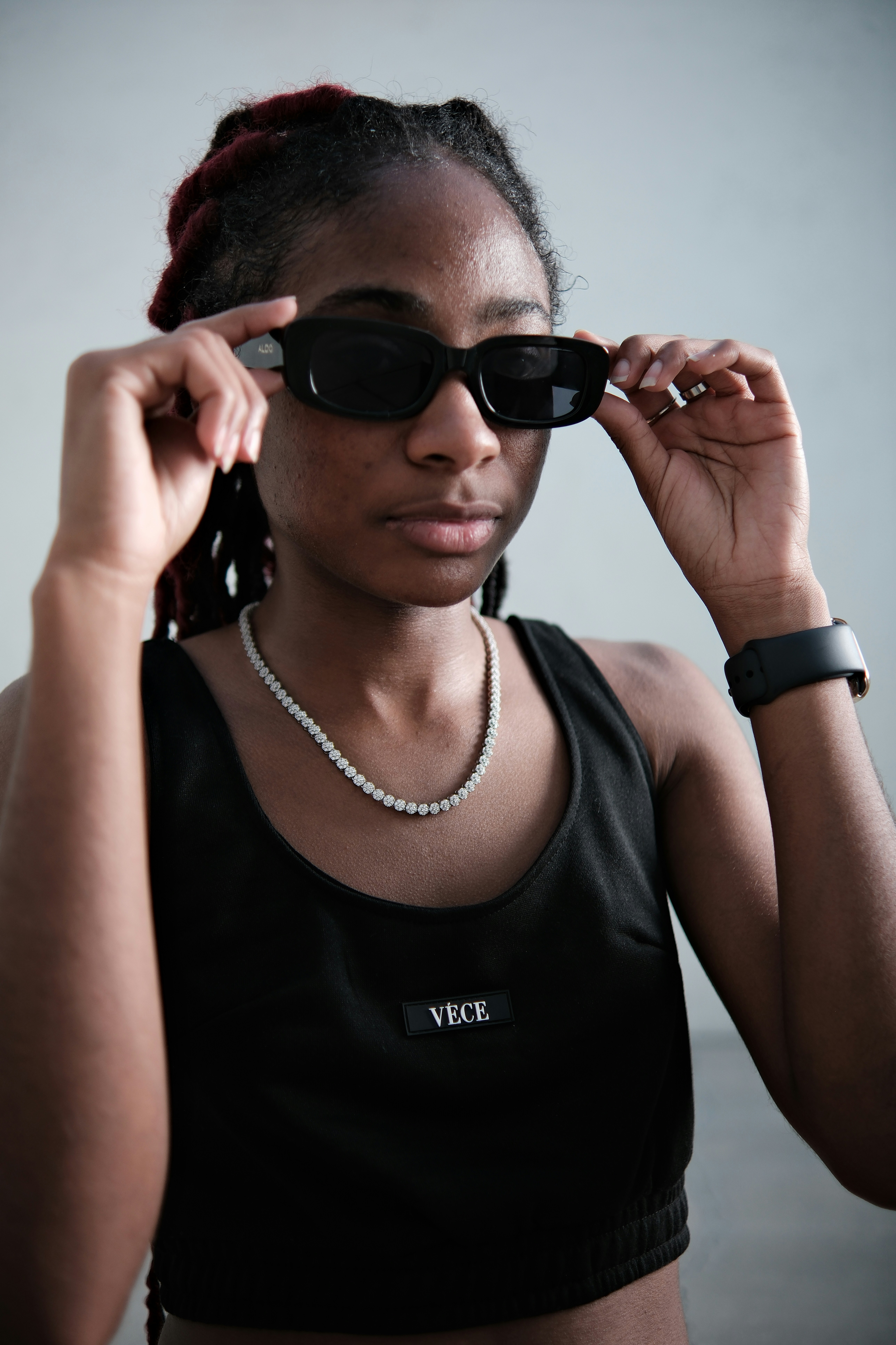 A woman wearing sunglasses and a black top photo – Free Fashion Image ...