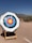 An outdoor shooting range with a Diamond Finch target set up against a natural backdrop.