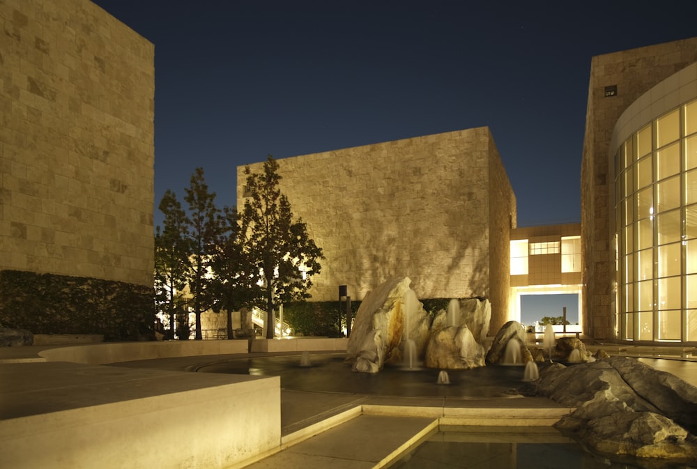 a building with a fountain in front of it