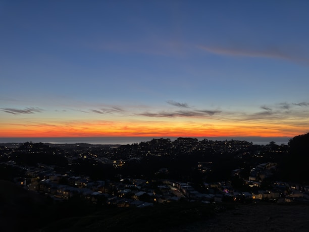 A panoramic view of Cape Town’s cityscape with vibrant colors during golden hour.