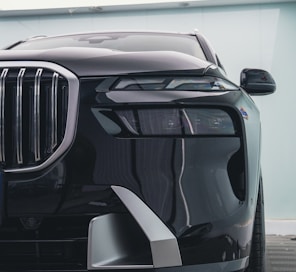 a close up of the front of a black car