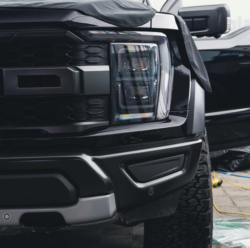 a close up of a truck's grille and bumper