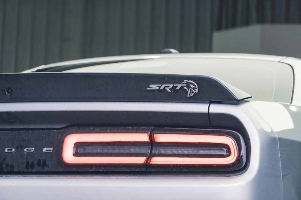 a close up of the tail light of a sports car