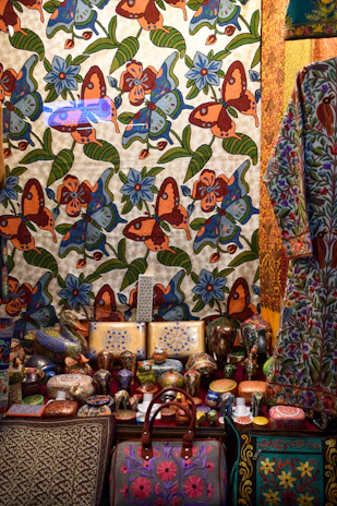 Artful composition of Ecuadorian products arranged with subtle yellow and blue accents reflecting the flag.