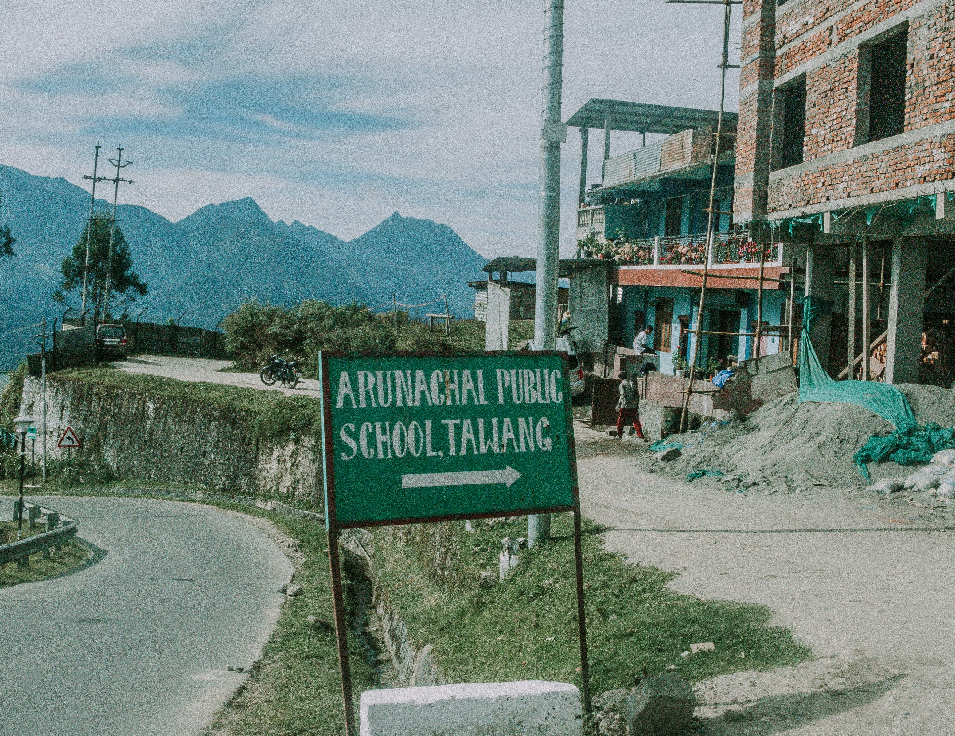 a street sign on the side of a road